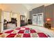 Open bedroom with high ceiling and access to the living room and patio at 2611 Laguna Shores Ln, Las Vegas, NV 89121