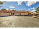 Charming townhome featuring a tile roof, two-car garage, and spacious driveway in a desirable neighborhood at 2611 Laguna Shores Ln, Las Vegas, NV 89121