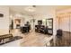 Living room showcases modern floors, lighting, and decorative mirrors at 2611 Laguna Shores Ln, Las Vegas, NV 89121
