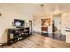 Living area featuring modern lighting fixtures, and hardwood flooring at 2611 Laguna Shores Ln, Las Vegas, NV 89121