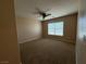 Cozy bedroom with ceiling fan and natural light from the window at 2628 Park Hyatt Ave, North Las Vegas, NV 89081