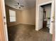 Cozy bedroom featuring carpet flooring, a ceiling fan, and an ensuite bathroom at 2628 Park Hyatt Ave, North Las Vegas, NV 89081