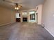 Inviting living room with carpet flooring, a fireplace, and ample space for entertaining at 2628 Park Hyatt Ave, North Las Vegas, NV 89081