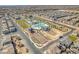 Aerial view of a Primary-planned community including a pool, park, basketball court and clubhouse at 2682 Weathered Copper Ave, North Las Vegas, NV 89086
