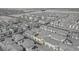 Aerial view of a residential neighborhood showing a home with solar panels on the roof at 2682 Weathered Copper Ave, North Las Vegas, NV 89086