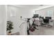 Upstairs bonus room with a desk and exercise equipment at 2682 Weathered Copper Ave, North Las Vegas, NV 89086