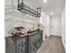 Entryway featuring hard surface flooring, beverage center, and white walls at 2682 Weathered Copper Ave, North Las Vegas, NV 89086