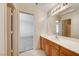 Bathroom view with a long vanity and sink, with a door leading to the bedroom at 2752 Drummossie Dr, Henderson, NV 89044