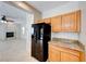 Kitchen view with stainless steel appliances and tile flooring at 2752 Drummossie Dr, Henderson, NV 89044