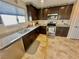 Well-equipped kitchen with stainless steel appliances, granite countertops, and ample storage space at 2790 Chetco River St, Laughlin, NV 89029