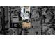 Highlighted lot in a monochrome aerial view showing proximity to home and neighboring pools at 2870 Belcastro St, Las Vegas, NV 89117