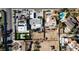Bird's eye view of a home with solar panels, a luxurious pool, and adjacent lot at 2870 Belcastro St, Las Vegas, NV 89117