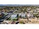 Expansive aerial shot showcases home with sleek solar panels and backyard lounge area nestled amongst neighborhood at 2870 Belcastro St, Las Vegas, NV 89117