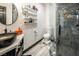 Stylish bathroom featuring a vessel sink, walk-in shower, and floating shelves for a modern and functional design at 2870 Belcastro St, Las Vegas, NV 89117
