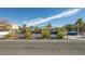 The property has great curb appeal with new landscaping, a secure fence, and a modern design at 2870 Belcastro St, Las Vegas, NV 89117
