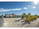 Beautifully renovated home with a modern exterior, spacious driveway, and tasteful landscaping at 2870 Belcastro St, Las Vegas, NV 89117