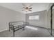 This airy bedroom features a ceiling fan, neutral walls, and soft natural lighting at 304 Orland St # 38, Las Vegas, NV 89107