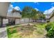 Community courtyard with mature trees, garden area, and well-maintained walkways at 304 Orland St # 38, Las Vegas, NV 89107