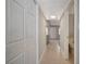 Hallway features a bathroom entrance and a glimpse of the neutral living spaces at 304 Orland St # 38, Las Vegas, NV 89107