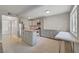 Spacious kitchen with stainless steel appliances, island with breakfast bar, and open layout at 304 Orland St # 38, Las Vegas, NV 89107
