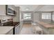Inviting kitchen with stainless steel appliances, extended breakfast bar, and convenient access to outdoor views at 304 Orland St # 38, Las Vegas, NV 89107