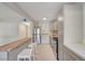 Modern kitchen with a breakfast bar, stainless appliances, and sleek countertops at 304 Orland St # 38, Las Vegas, NV 89107