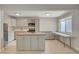 Bright kitchen offering stainless steel appliances, island, and breakfast bar space for modern living at 304 Orland St # 38, Las Vegas, NV 89107