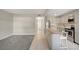 Modern kitchen with a convenient breakfast bar, flowing into a spacious carpeted living area at 304 Orland St # 38, Las Vegas, NV 89107