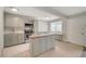 The kitchen features stylish countertops, gray cabinetry, and includes modern appliances at 304 Orland St # 38, Las Vegas, NV 89107