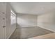 Neutral living room with gray carpet, a window, and a modern interior at 304 Orland St # 38, Las Vegas, NV 89107