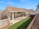 Private backyard with a covered patio, desert landscaping, and plenty of room for outdoor entertaining at 350 Loma Marsh Ct, North Las Vegas, NV 89084
