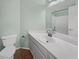Bright bathroom with a white vanity, toilet and shower/tub combo at 350 Loma Marsh Ct, North Las Vegas, NV 89084