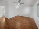 Spacious bedroom featuring laminate flooring, ceiling fan, and natural light at 350 Loma Marsh Ct, North Las Vegas, NV 89084
