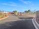 Gated community entrance with manicured landscaping, providing security and a welcoming first impression at 350 Loma Marsh Ct, North Las Vegas, NV 89084