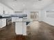 Bright kitchen with granite countertops, stainless steel appliances, and a center island at 350 Loma Marsh Ct, North Las Vegas, NV 89084