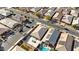 A bird's eye view shows a neighborhood home with a spacious backyard patio perfect for entertaining at 370 Mano Destra Ln, Henderson, NV 89011
