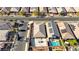 A bird's eye view shows a neighborhood home with backyard patio perfect for entertaining with pavers and dining set at 370 Mano Destra Ln, Henderson, NV 89011