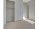 A simple bedroom is enhanced with an adjacent closet for efficient storage and organization at 370 Mano Destra Ln, Henderson, NV 89011