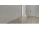 A bright hallway featuring tile flooring and neutral walls that enhance the sense of space at 370 Mano Destra Ln, Henderson, NV 89011