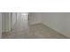 A bright hallway featuring tile flooring and neutral walls that enhance the sense of space at 370 Mano Destra Ln, Henderson, NV 89011