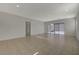 Spacious living room with sliding glass doors providing access to the backyard at 370 Mano Destra Ln, Henderson, NV 89011