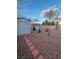 Backyard with a storage shed, small trees, and a path at 3748 E Hacienda Ave, Las Vegas, NV 89120