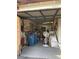 Garage with storage, garage door, and concrete flooring at 3748 E Hacienda Ave, Las Vegas, NV 89120