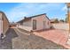 Backyard featuring gravel and block landscaping at 4153 Broadriver Dr, Las Vegas, NV 89108