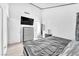 Bedroom featuring tiled floors, a mounted TV, and neutral decor at 4153 Broadriver Dr, Las Vegas, NV 89108