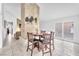 Inviting dining area adjacent to the living room with neutral tones at 4153 Broadriver Dr, Las Vegas, NV 89108