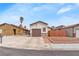 Single-story home with a desert landscape and a private driveway at 4153 Broadriver Dr, Las Vegas, NV 89108