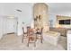 Inviting living area with stylish decor, tiled floors, and ample natural light at 4153 Broadriver Dr, Las Vegas, NV 89108