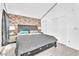 A well-lit main bedroom features a modern accent wall and neutral tones at 4153 Broadriver Dr, Las Vegas, NV 89108