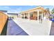 Backyard featuring a covered patio area with a pool table and stainless steel appliances at 4735 Monterrey Ave, Las Vegas, NV 89121